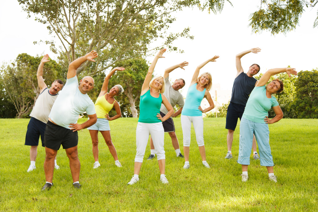 Steady-and-calm-seniors-exercising-on-trip